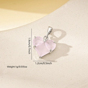 Detail view of pink heart zircon pendant showing dimensions 1.9cm height and 1g weight