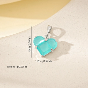 Detailed macro view showing the size dimensions of the light blue heart zircon pendant