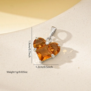 Detailed size specifications for a zircon heart pendant with orange gemstone and silver hook