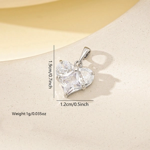 Detail view of heart-shaped zircon pendant with 1.9cm height and 1.2cm width measurements