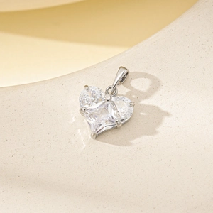 Sparkling zircon heart pendant crafted in silver metal with claw setting for jewelry making