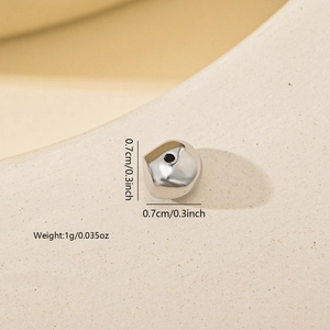 Macro shot of 0.7cm silver irregular multifaceted metal bead for DIY jewelry making