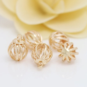Five gold hollow lantern pendants for DIY necklaces and earrings with a polished finish
