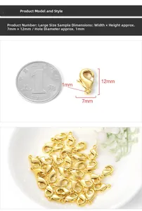 Detail of 7x12mm gold lobster clasp showing exact dimensions and coin for size scale