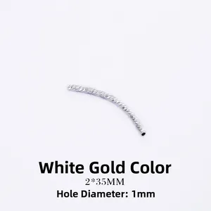 Detailed 2x35mm silver-plated curved metal tube bead with faceted texture for jewelry DIY