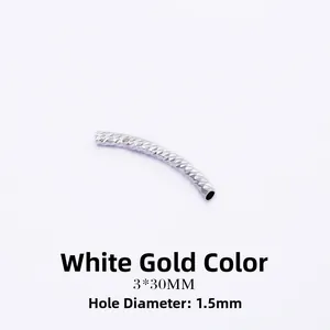 Close-up of 3x30mm white gold plated curved tube bead with textured diamond-cut surface