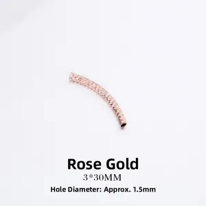 Detail of rose gold curved tube bead 3x30mm with diamond-cut texture for DIY jewelry
