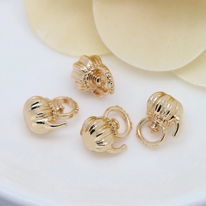 Set of four gold teapot pendants with vertical ridges for DIY jewelry making