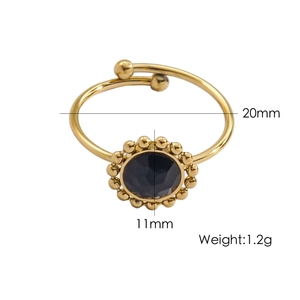 Detailed view of adjustable gold-finish ring with black faceted gemstone and dimensions
