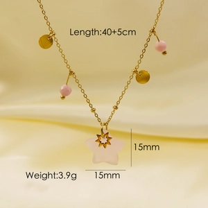 Detail of pink star stone pendant on gold stainless steel chain with size measurements