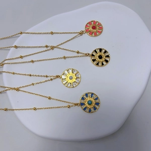Bohemian gold stainless steel necklace set with four colorful sunburst enamel pendants