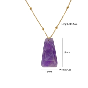 Gold chain necklace with purple trapezoid natural stone pendant and bead accents
