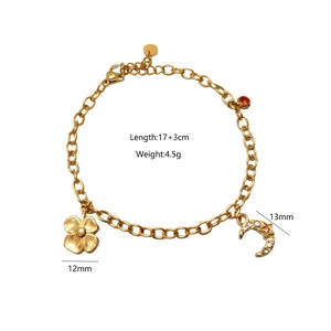 Detail of gold chain bracelet with moon and flower charms showing 17+3cm length