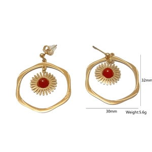 Golden hexagonal sunflower earrings with red natural stone center, 32mm drop size