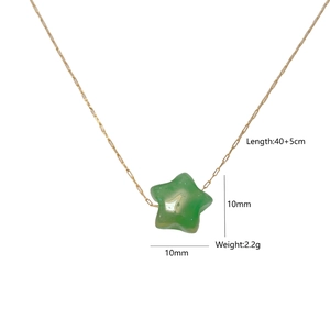 Detail view of a green natural stone star pendant necklace with 40+5cm gold chain specs