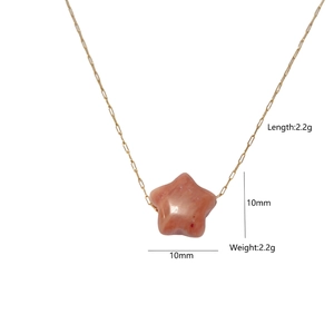 Minimalist gold chain necklace with star-shaped natural stone pendant in pink-orange