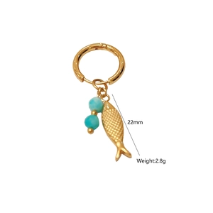 Detailed view of gold hoop earring with turquoise beads and engraved fish charm, 22mm size