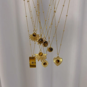 Conjunto de collares con colgantes de ojo de tigre dorado y cadenas de bolas retro