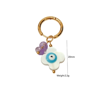 Detail showing 20mm drop earrings with blue evil eye charm and purple heart bead