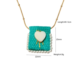 Detailed size specifications for a woven blue heart pendant necklace with pearls
