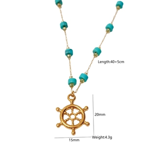 Detailed view of nautical helm pendant necklace with turquoise beads and size specs