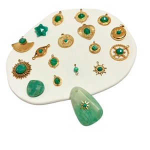 Assorted gold plated charms with green natural stones in vintage heart and star shapes