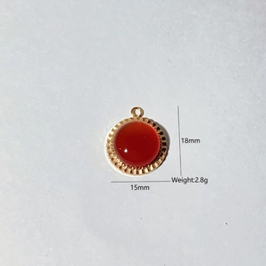 Handmade stainless steel round pendant with 18mm red natural stone and gold floral plating