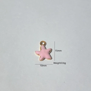 Detailed view of pink enamel starfish pendant in gold plated stainless steel, size 15x10mm
