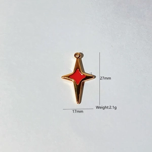 Detailed view of red star pendant showing 27mm height and 17mm width measurements