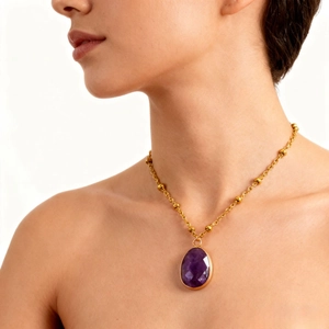 Vintage teardrop purple stone pendant necklace on a gold beaded titanium steel chain