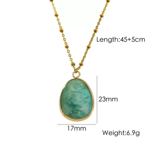 Detail showing dimensions of vintage gold chain necklace with a turquoise stone pendant