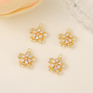 Pendentifs fleurs dorées avec zircons blancs pour la création de bijoux DIY