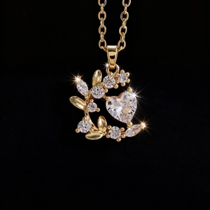 Collar Árbol de la Vida dorado con circón en forma de corazón y detalles de hojas