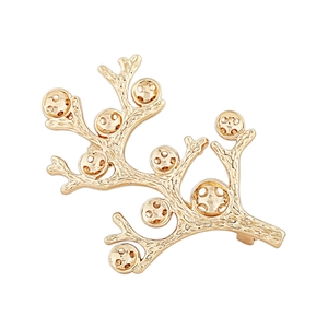 Gouden koraaltak broche met bionische texturen en metalen opengewerkte details