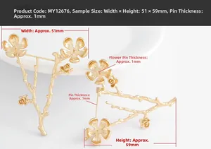 Detailed view of gold-plated flower and branch jewelry finding measuring 51x59mm