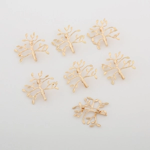 Golden tree-shaped brooch pins for DIY crafts with detailed branches and pin clasp