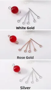 Chiodini a occhiello e perle rosse per gioielli in oro bianco, rosa e argento