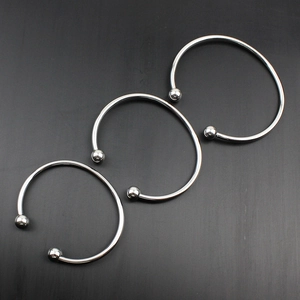 Bracciali rigidi aperti in acciaio inossidabile argento lucido con sfere a vite