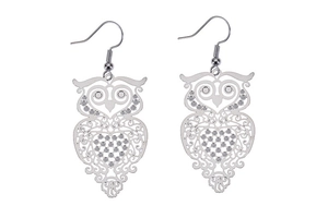 Detailed close-up of hollowed-out owl drop earrings featuring sparkling rhinestones
