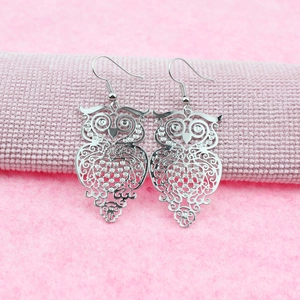Elegant silver owl drop earrings with intricate cutout feather patterns for women