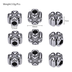 Retro heart-shaped clover steel charm beads with macro dimensions and weight specs