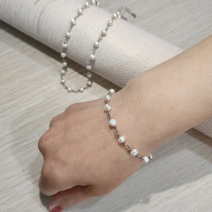Minimalist freshwater pearl bracelet and necklace set with silver chain detail