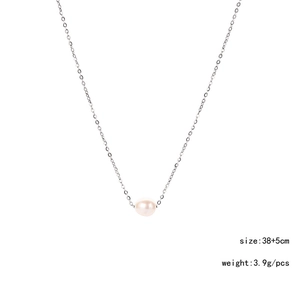 Detail of minimalist stainless steel necklace with 38+5cm length and single pearl charm