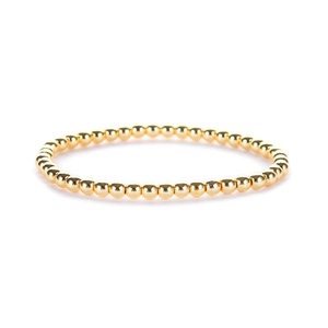 Dettaglio del bracciale elastico a sfere placcato oro 14K con finitura lucida a specchio