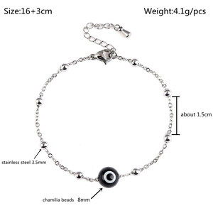 Detail showing 8mm evil eye bead and 3.5mm steel beads on 18K gold plated chain