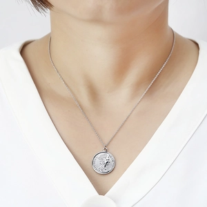Silver Queen Elizabeth coin necklace with a vintage medallion pendant and cable chain
