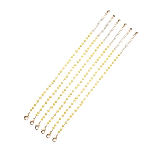 Set of six gold faceted glass beaded bracelets with lobster clasps and extension chains