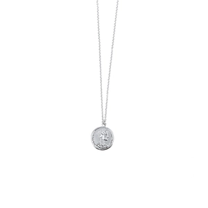 Macro shot of silver coin pendant featuring Queen Elizabeth II profile on fine link chain