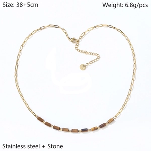 Detail of 18K gold plated paperclip chain necklace with natural tiger eye stone and lobster clasp