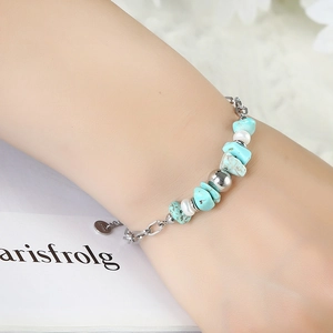 Bracciale in acciaio inossidabile dorato con pietre blu e perle d'acqua dolce naturale